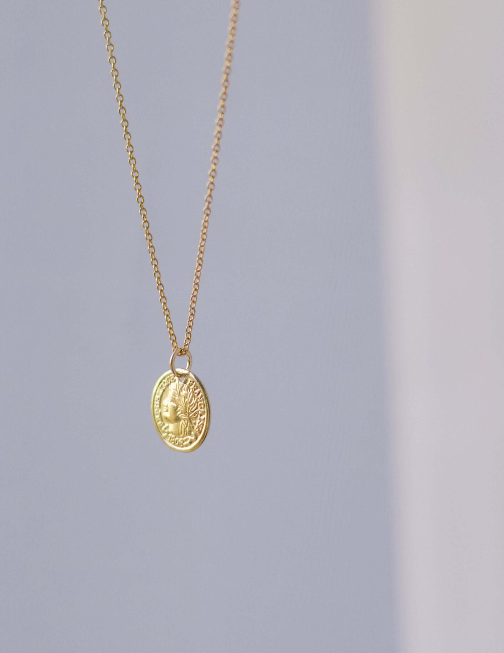 14k Gold Coin Necklace featuring an 1808 Republique Francoise charm, luxurious design perfect for style elevation.