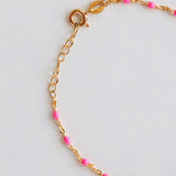 14k gold-filled pink beaded bracelet featuring blush pink beads on a delicate chain, perfect for summer elegance.