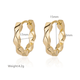 Hammered effect gold stainless steel hoop earrings, 17mm diameter, stylish and durable jewelry for modern fashion.