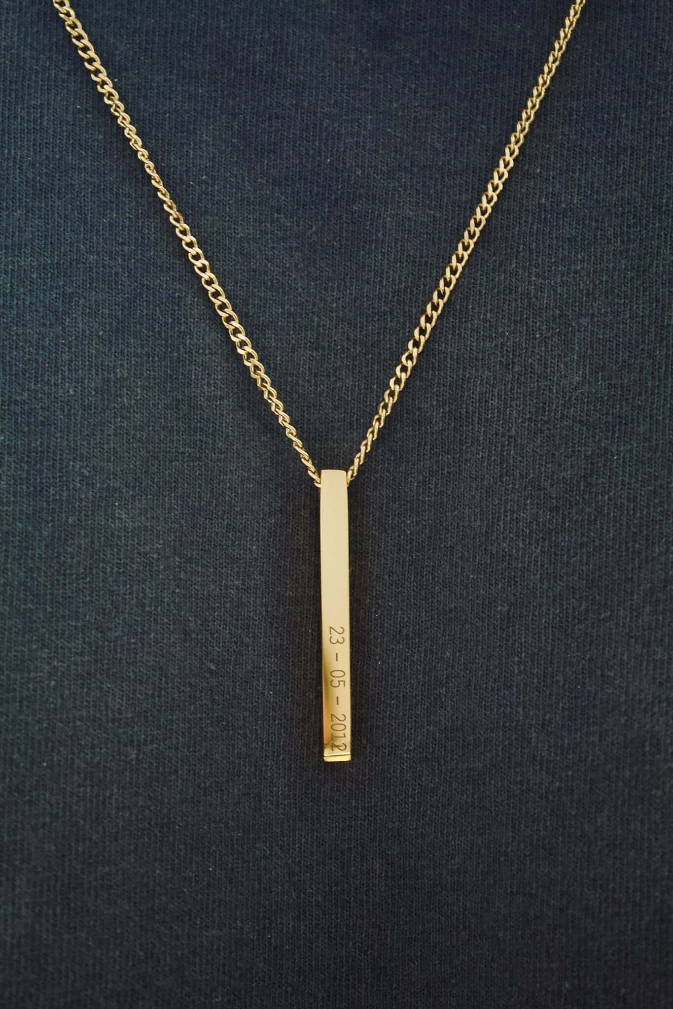 Gold personalised bar necklace with engraved date, perfect for meaningful gifts and elegant jewelry.
