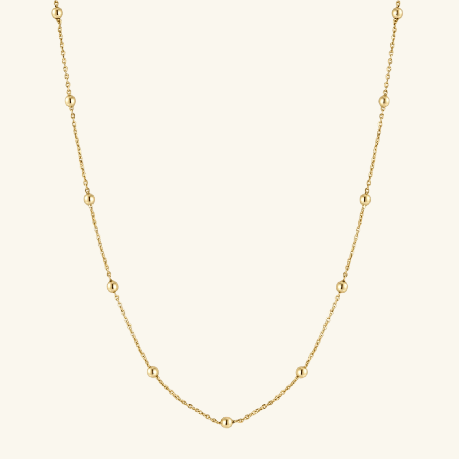 14K gold chunky bead necklace with adjustable length and water-resistant design, perfect for any occasion.