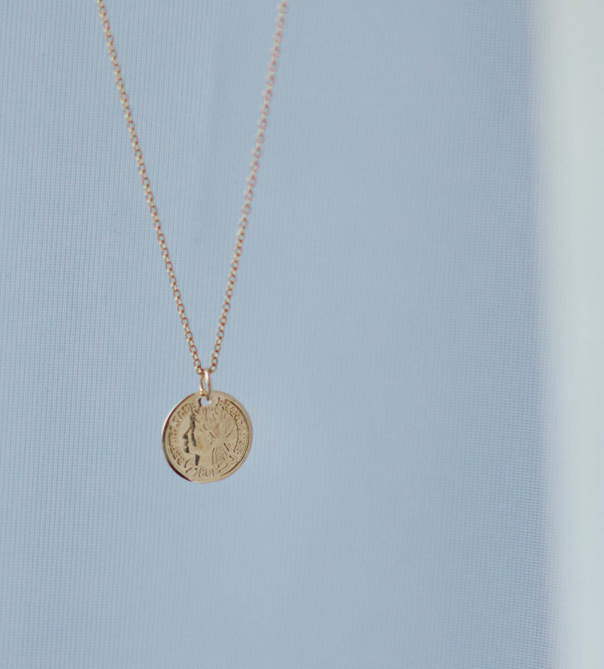 14k gold filled coin necklace featuring Republique Francoise 1808 coin charm on a delicate chain.