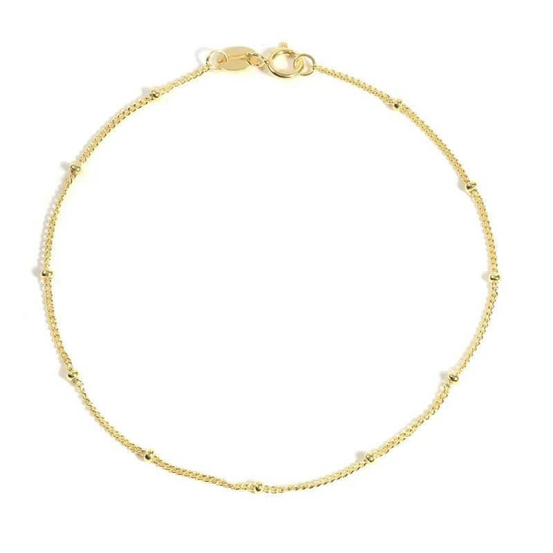 Gold Satellite Bracelet made of high-quality stainless steel, featuring a delicate design and secure spring ring clasp.