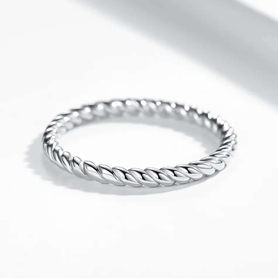 Silver Twisted Stacking Ring showcasing a delicate twisted design, perfect for versatile and stylish accessory options.