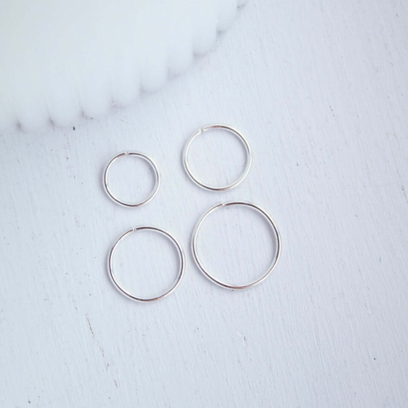 Amazon.com: Silver Nose Ring 20 Gauge - Tiny Sterling Silver Nose Hoop  Piercing - Thin Nose Jewelry for Women : Handmade Products