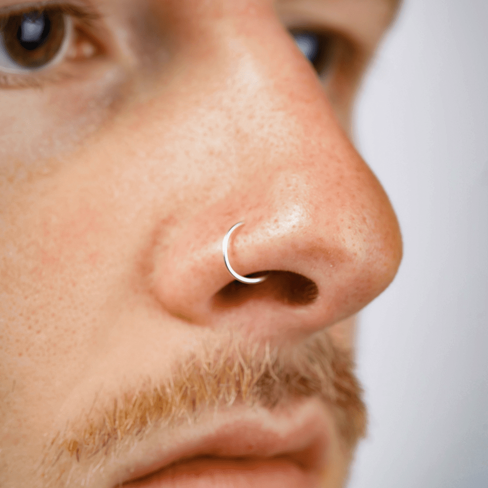 Mens ime hoop nose piercing